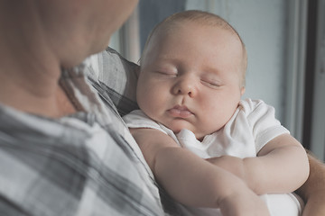 Image showing Father Holding Newborn Baby Son