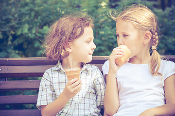 Image showing Two happy children  playing in the park at the day time.