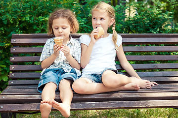 Image showing Two happy children  playing in the park at the day time.