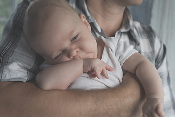 Image showing Father Holding Newborn Baby Son