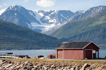 Image showing red barn on Norway fjord shore