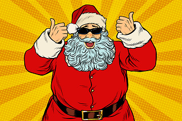 Image showing Thumbs up Santa Claus in sunglasses