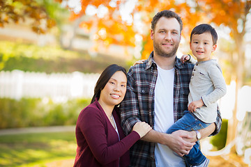 Image showing Outdoor Portrait of Mixed Race Chinese and Caucasian Parents and