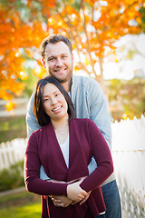 Image showing Outdoor Fall Portrait of Chinese and Caucasian Young Adult Coupl