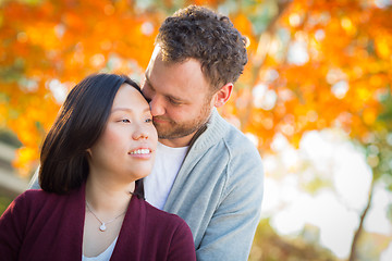 Image showing Outdoor Fall Portrait of Chinese and Caucasian Young Adult Coupl