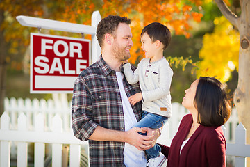 Image showing Mixed Race Chinese and Caucasian Parents and Child In Front of F