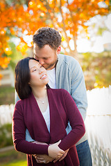 Image showing Outdoor Fall Portrait of Chinese and Caucasian Young Adult Coupl