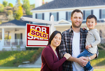 Image showing Mixed Race Chinese and Caucasian Parents and Child In Front of H