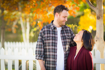 Image showing Outdoor Fall Portrait of Chinese and Caucasian Young Adult Coupl