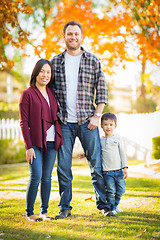 Image showing Outdoor Portrait of Mixed Race Chinese and Caucasian Parents and