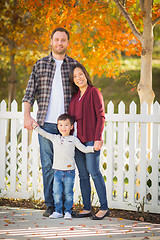 Image showing Outdoor Portrait of Mixed Race Chinese and Caucasian Parents and