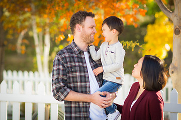Image showing Outdoor Portrait of Mixed Race Chinese and Caucasian Parents and