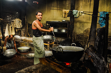 Image showing Man with ladle in Bangladesh