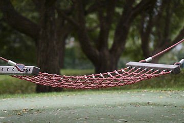 Image showing empty cable hammock in a park