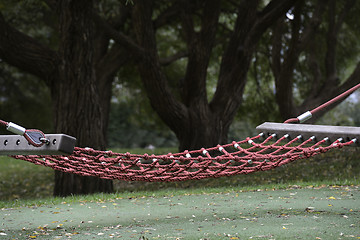 Image showing empty cable hammock in a park