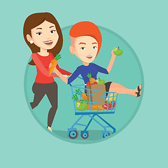 Image showing Couple of friends riding by shopping trolley.