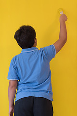 Image showing Portrait of a happy young boy painter