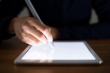 Image showing Woman using pen drawing on tablet pc