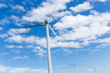 Image showing Wind turbine with blue sky