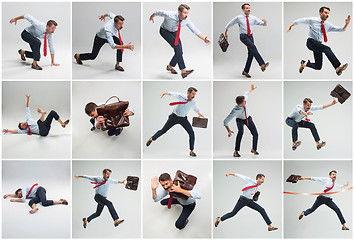 Image showing Businessman running with a briefcase on gray background