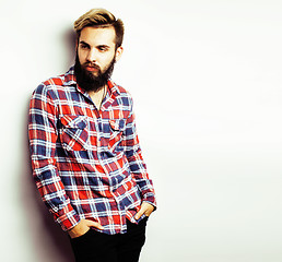 Image showing portrait of young bearded hipster guy on gray dark background close up, brutal modern man, lifestyle people concept 