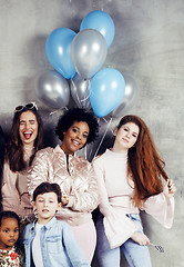 Image showing Lifestyle and people concept: young pretty diversity nations woman with different age children celebrating on birth day party together happy smiling, making selfie. African-american, asian and caucasi