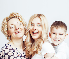 Image showing happy smiling family together posing cheerful on white background, lifestyle people concept, mother with son and teenage daughter isolated