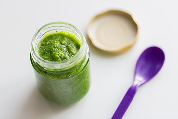 Image showing jar of vegetable puree or baby food and spoon