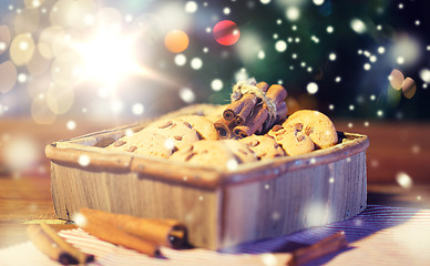 Image showing close up of christmas oat cookies on wooden table