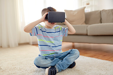 Image showing little boy in vr headset or 3d glasses at home