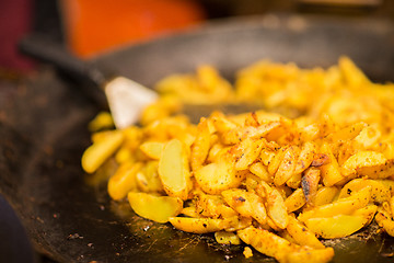 Image showing fried potato on stir fry pan