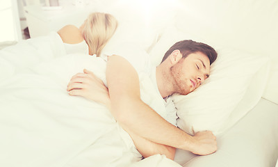 Image showing couple sleeping in bed at home