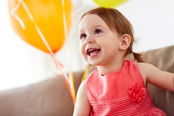 Image showing happy baby girl on birthday party at home