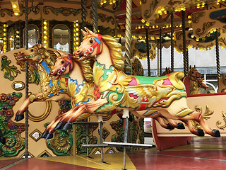 Image showing Horses on a Carousel Merry Go Round  