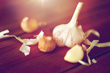 Image showing close up of garlic on wooden table