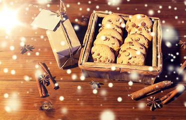 Image showing close up of christmas oat cookies on wooden table