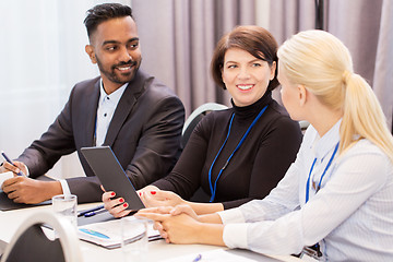 Image showing team with tablet pc at business conference