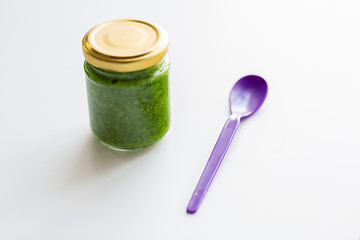 Image showing jar of vegetable puree or baby food and spoon