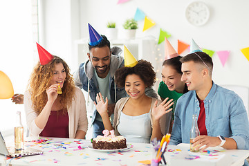 Image showing team greeting colleague at office birthday party