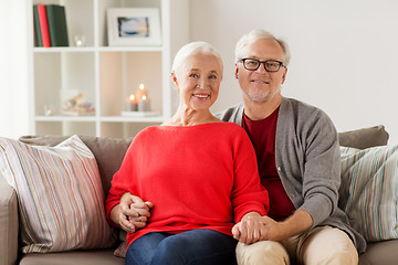 Image showing happy smiling senior couple at christmas