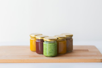 Image showing vegetable or fruit puree or baby food in jars