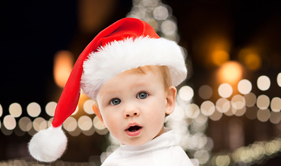 Image showing little baby boy in santa hat at christmas