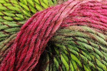 Image showing coil of colorful wool, red and green 