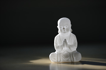 Image showing plastic small buddha sculpture