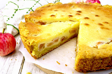 Image showing Pie apple with sour cream on parchment