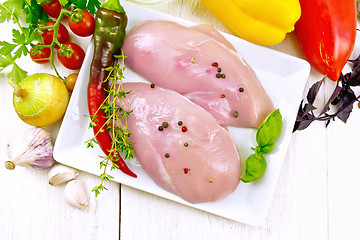 Image showing Chicken breast raw in plate on light board top