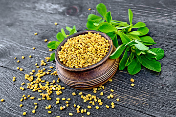 Image showing Fenugreek with leaf in bowl on board