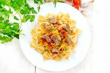 Image showing Farfalle with turkey and vegetables on light board top