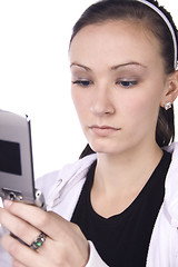 Image showing Concerned Teenage Girl Texting