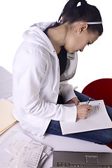 Image showing Teen Girl Paying Bills and Making a To Do List